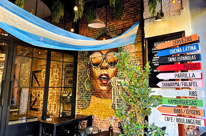Buenos Aires Food Tour: Local Dishes, Steak, Empanada & More - Evita’s moment at Plaza Inmigrantes de Armenia